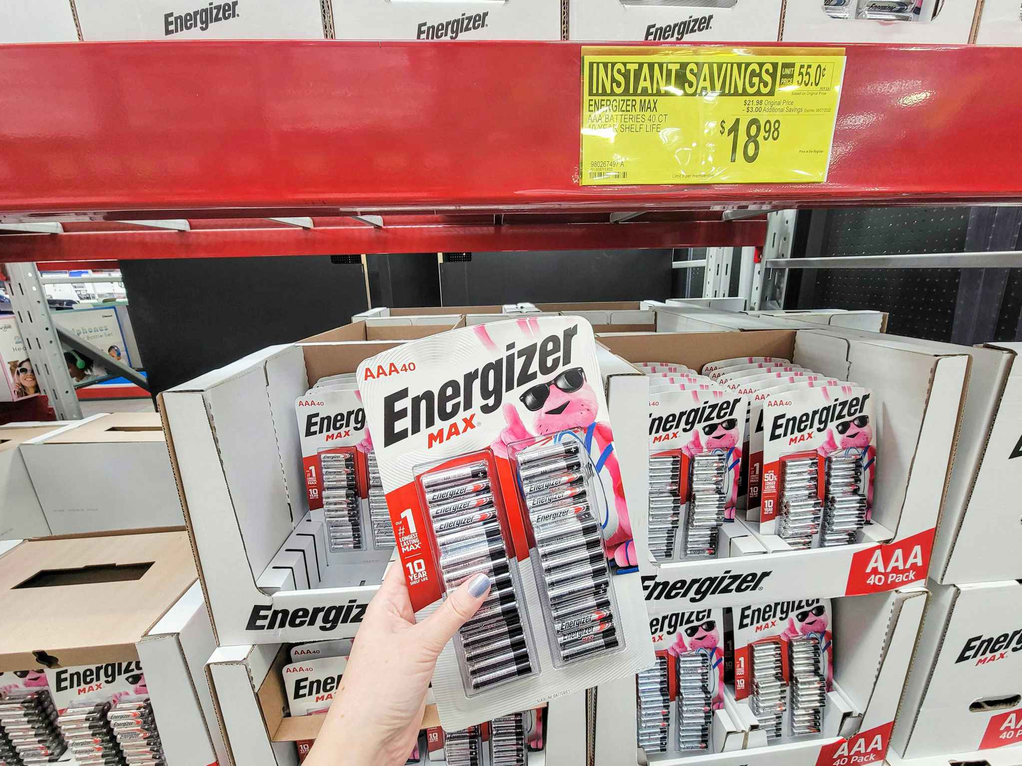 hand holding a 40 pack of energizer aaa batteries