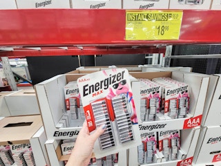 hand holding a 40 pack of energizer aaa batteries