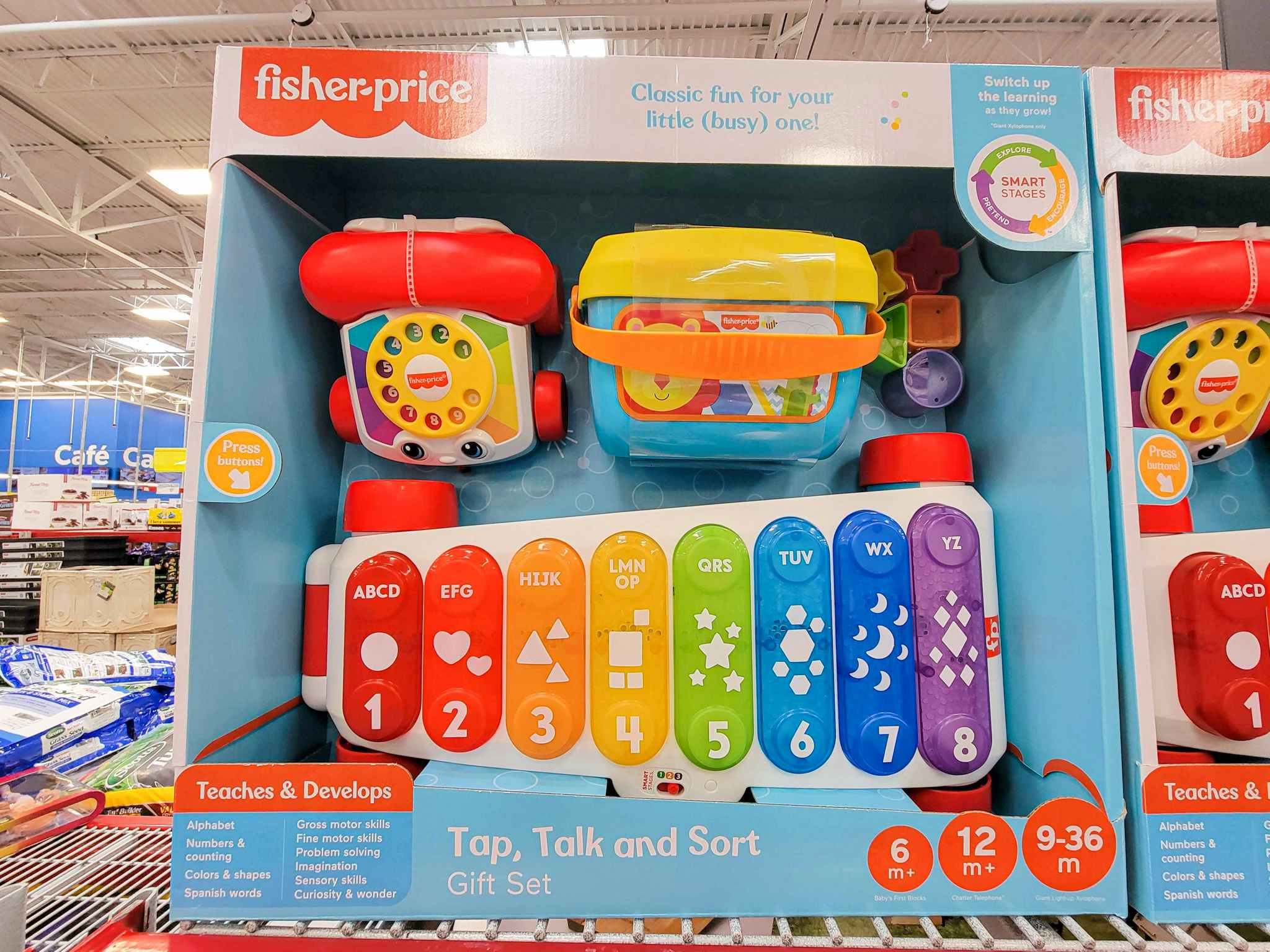 set of 3 fisher price preschool toys in a box on a shelf