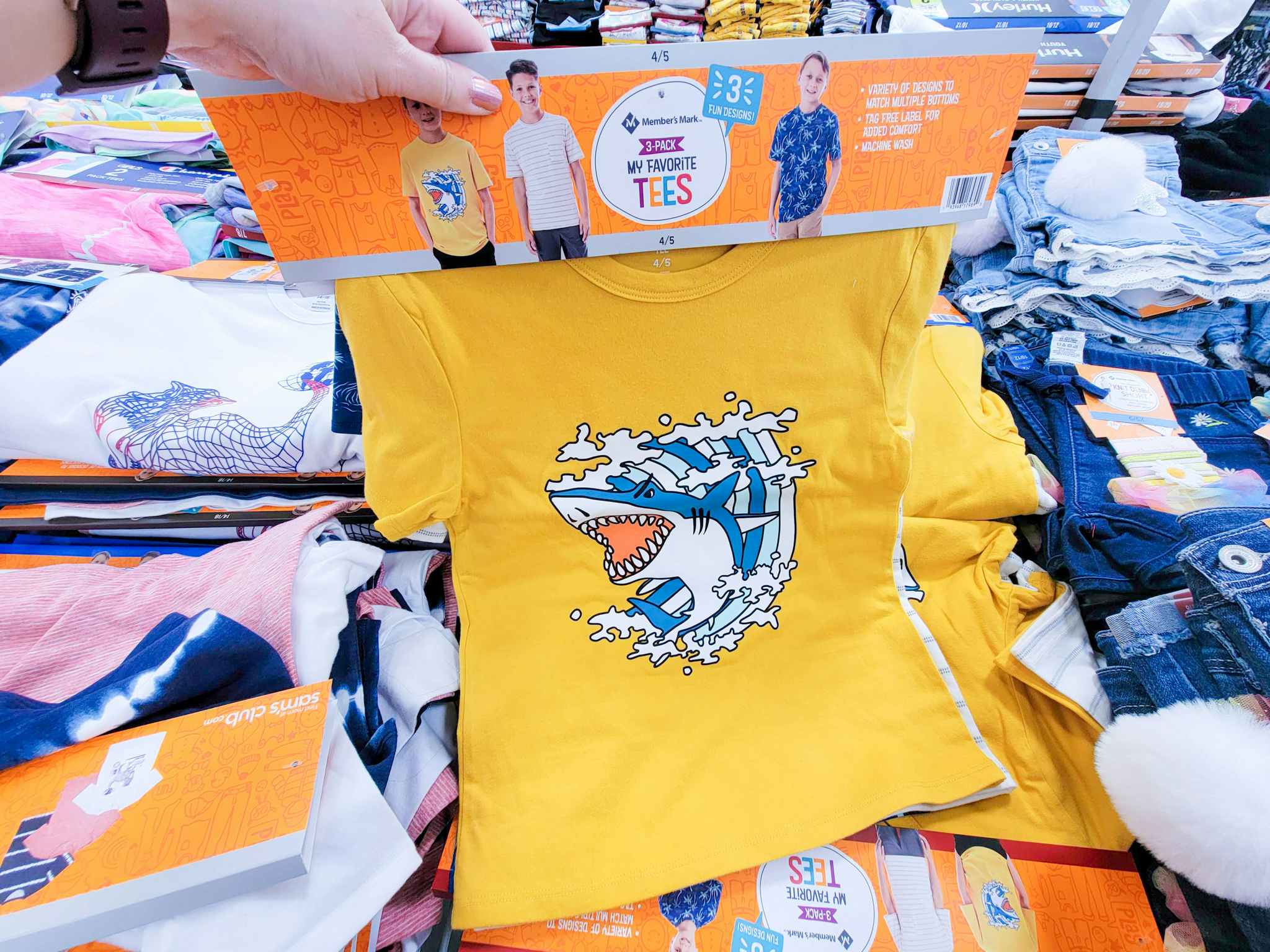 3 pack of kids tees, the front one is yellow with a shark
