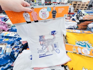 3 pack of kids tees, front one is white with a trex on it