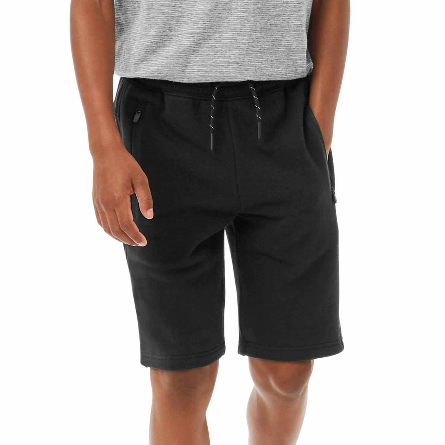 child wearing a pair of black knit shorts that are knee length