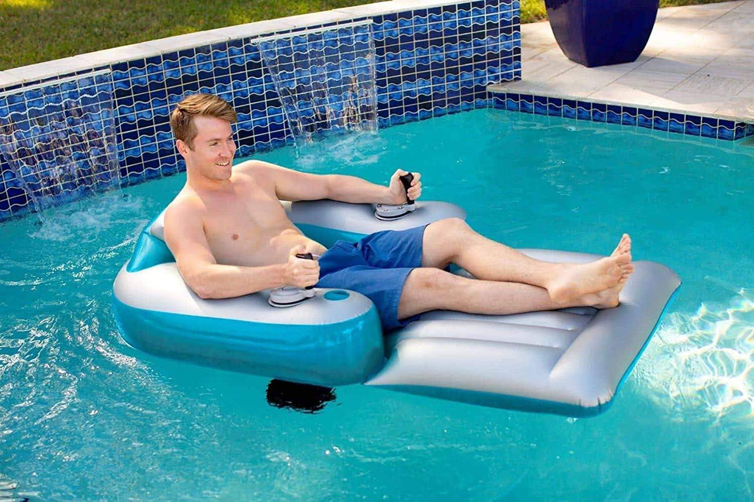 man in a motorized inflatable pool lounger