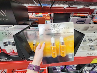hand holding a 2 pack of olay vitamin c serum