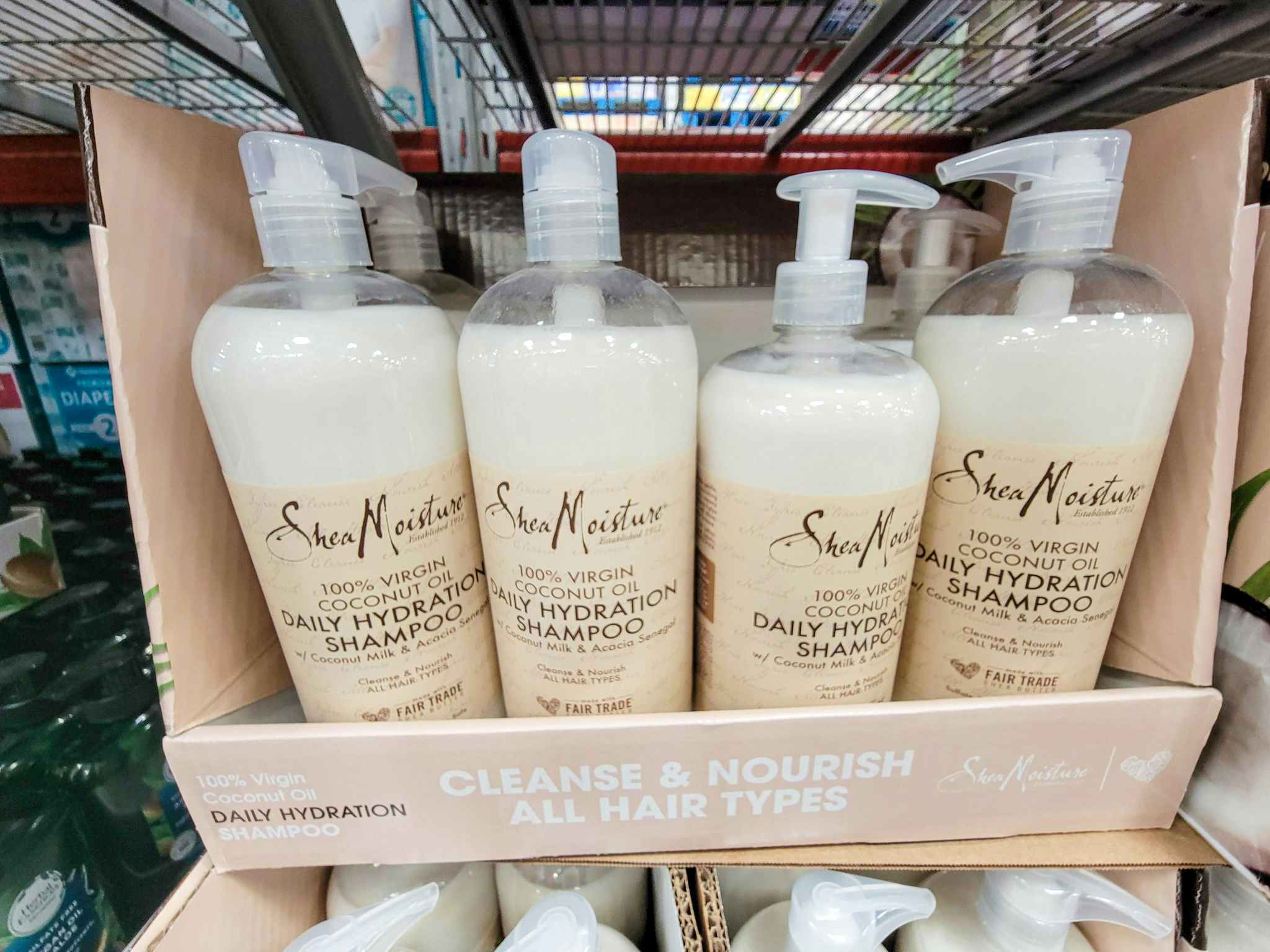 display of large bottles of shea moisture shampoo