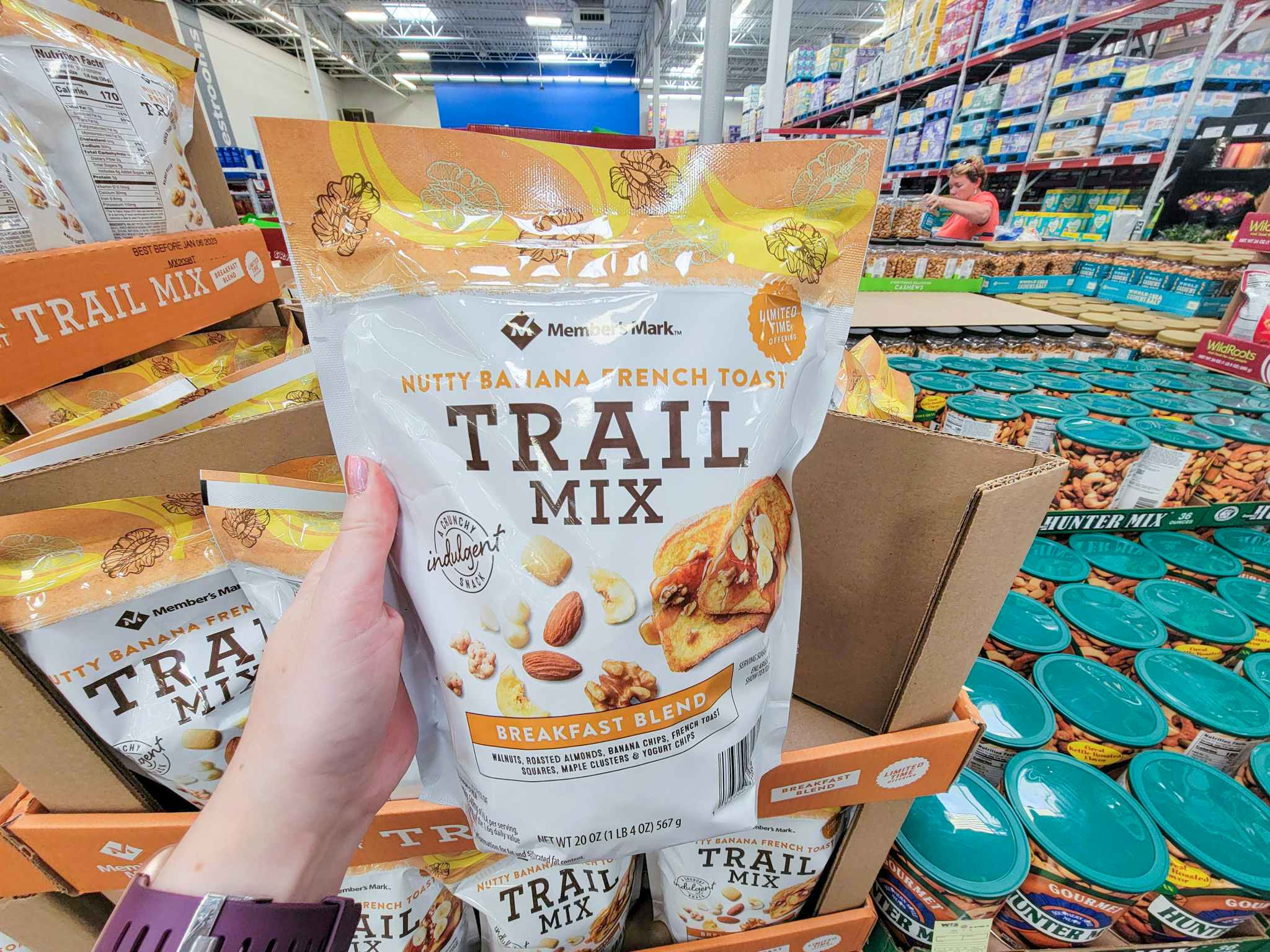 hand holding a bag of french toast flavored trail mix