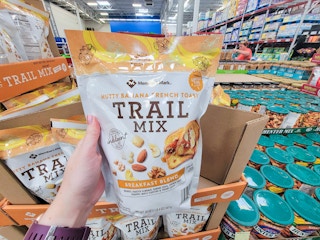 hand holding a bag of french toast flavored trail mix