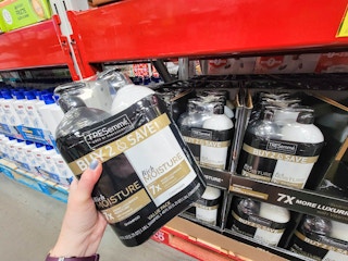 hand holding a 2 pack of tresemme shampoo and conditioner