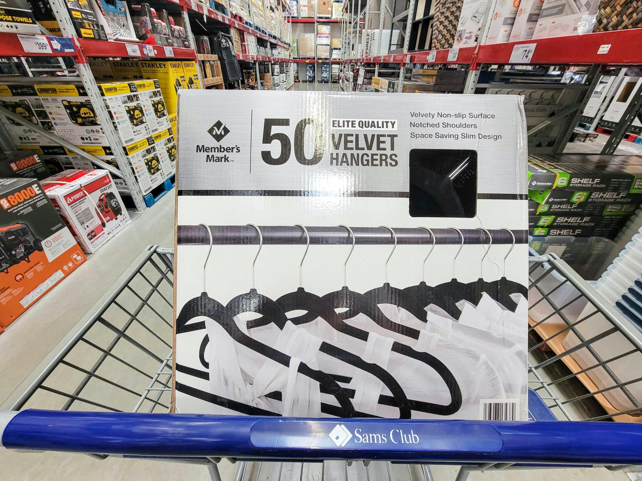 a 50 pack of velvet hangers in a cart