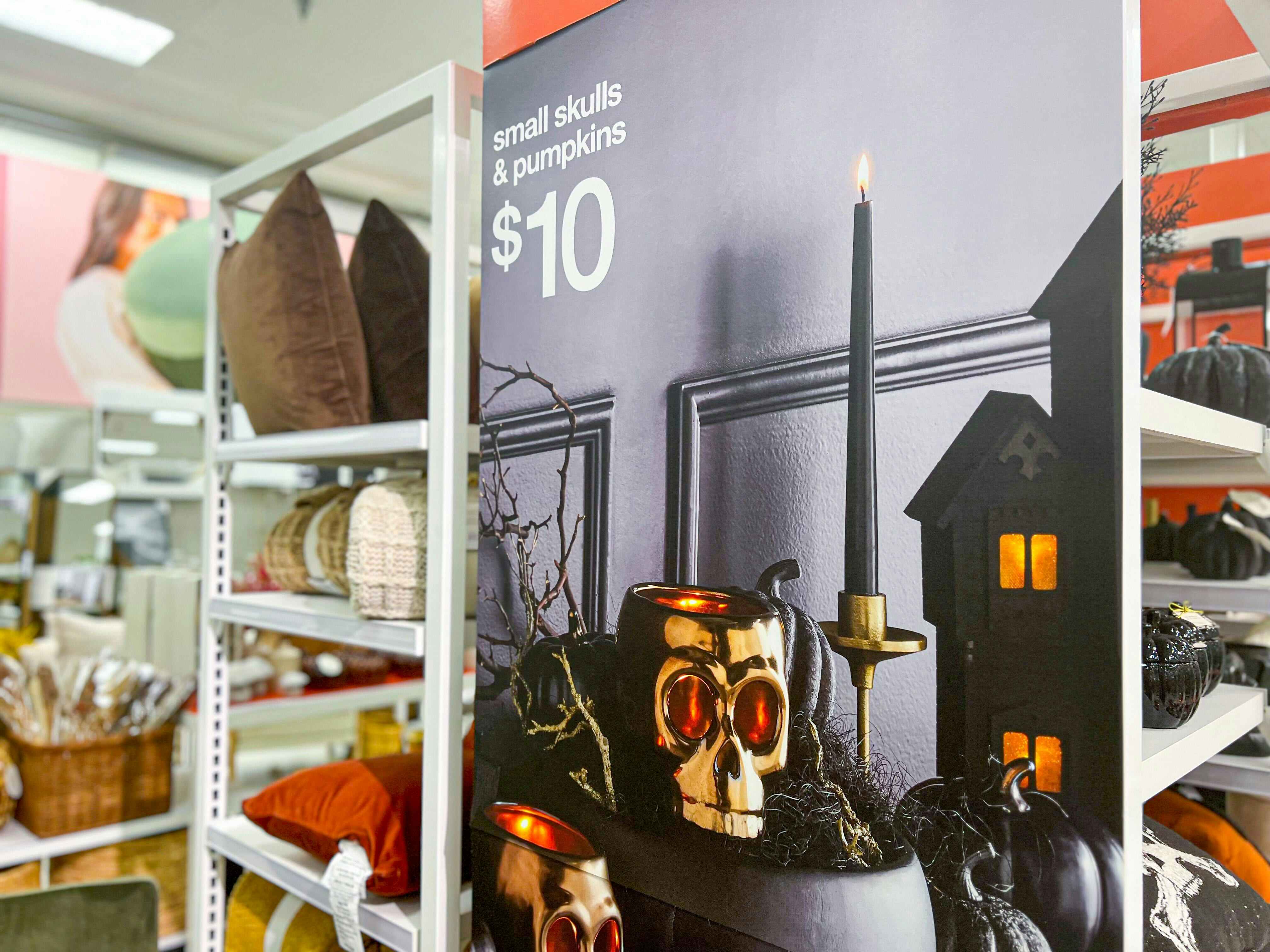 A halloween sign at target that reads: small skulls and pumpkins for $10