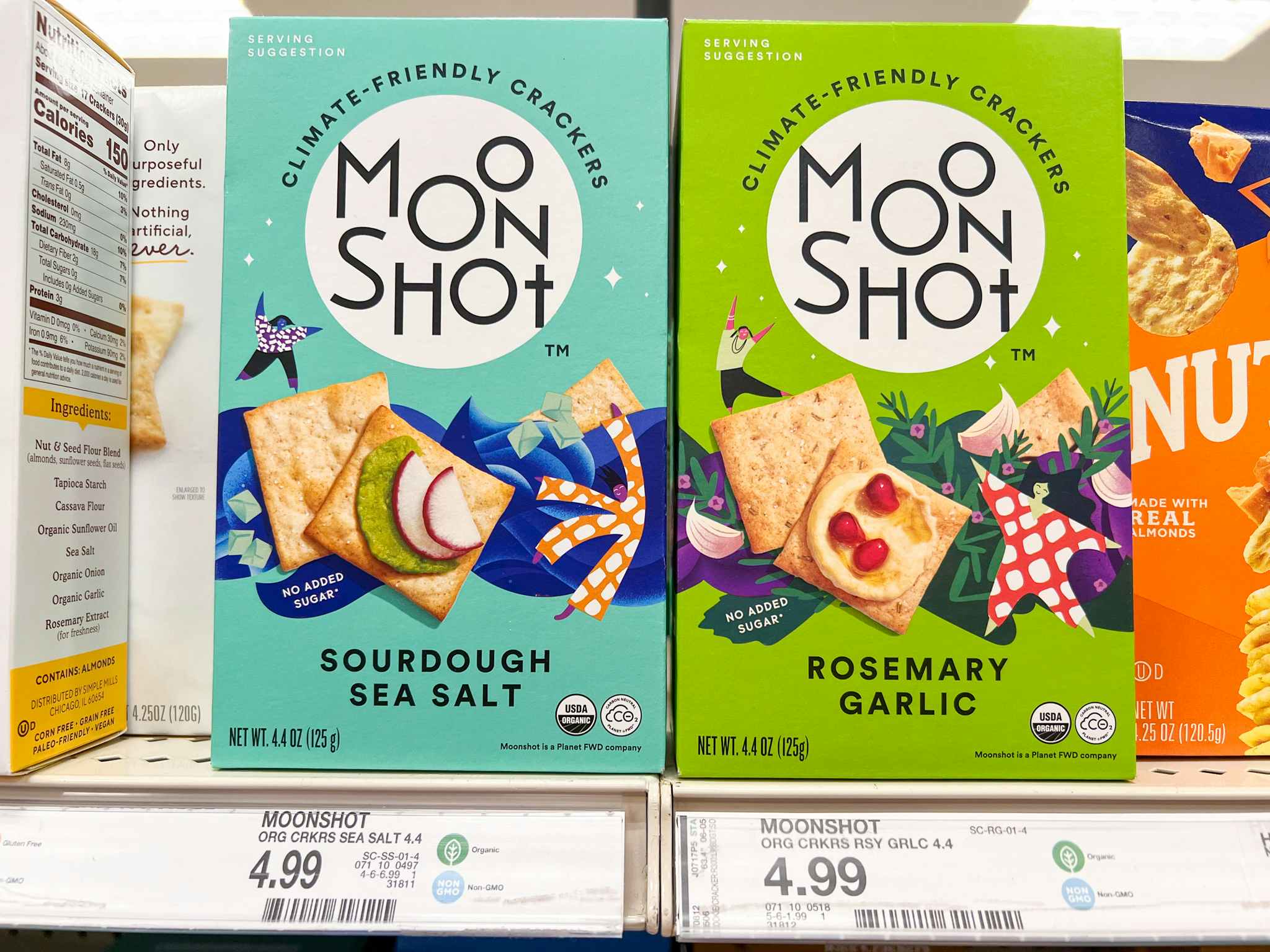 Boxes of moonshot crackers on a Target shelf with price tags