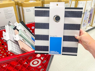hand holding room essentials black striped cube storage bin at target