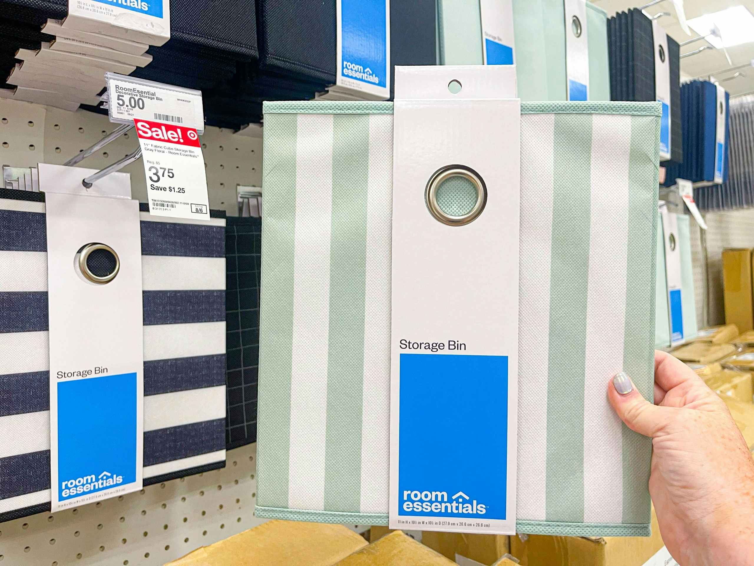 hand holding room essentials mint striped cube storage bin at target