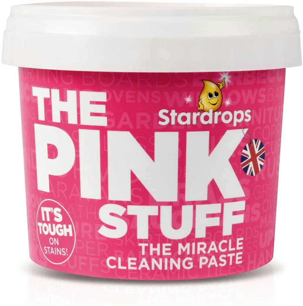A container of Stardrops The Pink Stuff miracle cleaning paste on a white background.