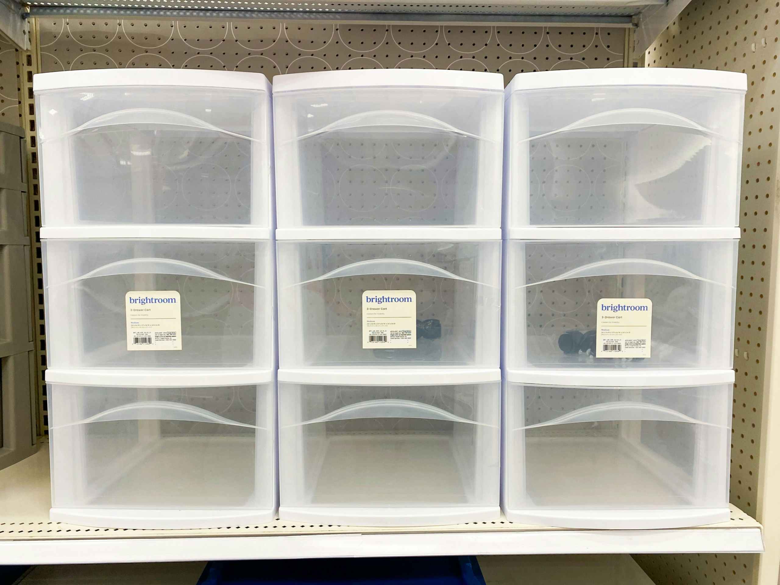 Three medium storage carts with three drawers on a Target shelf