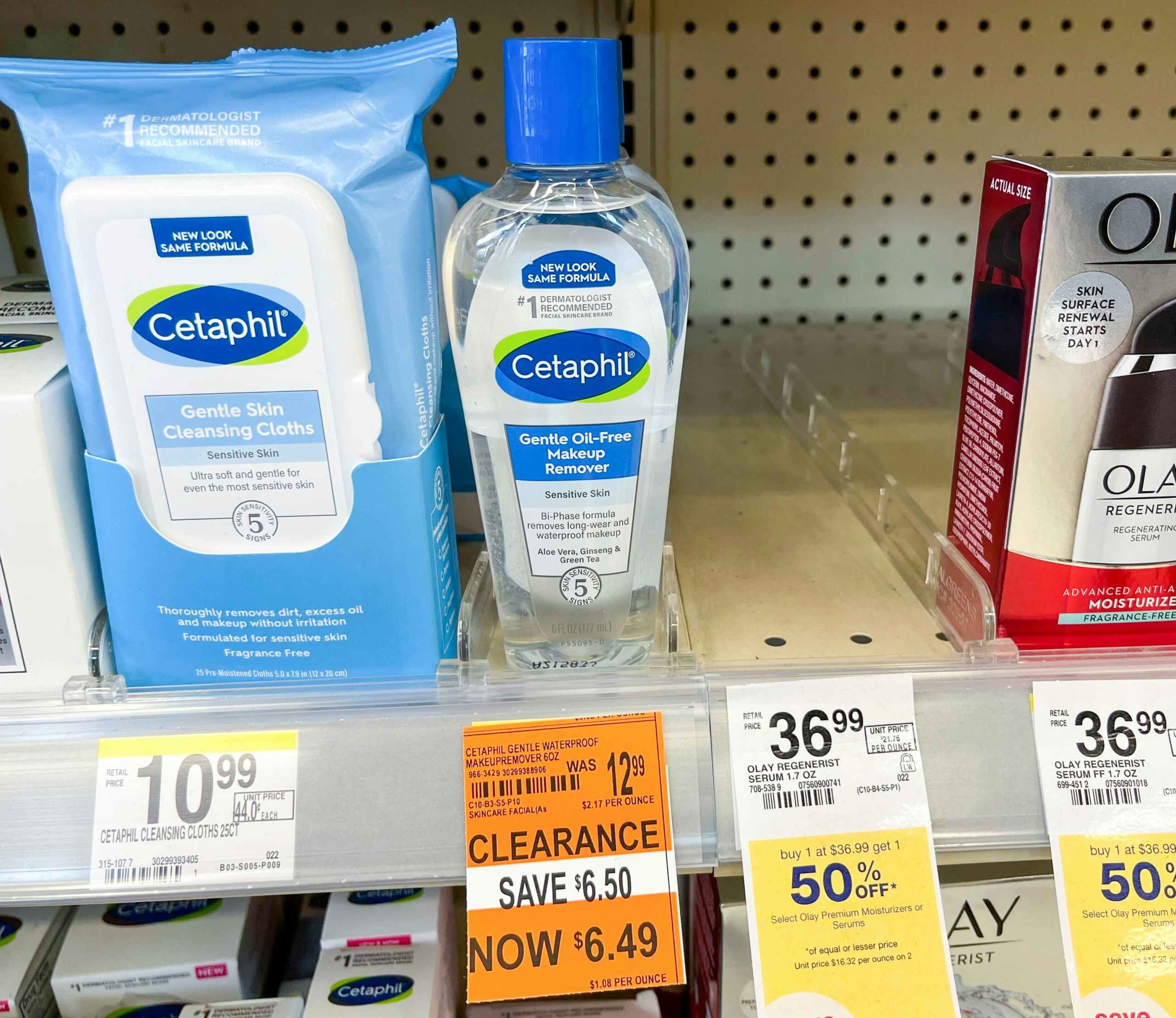 bottle of Cetaphil oil free makeup remover on shelf with Cetaphil cleansing cloths and clearance tag underneath