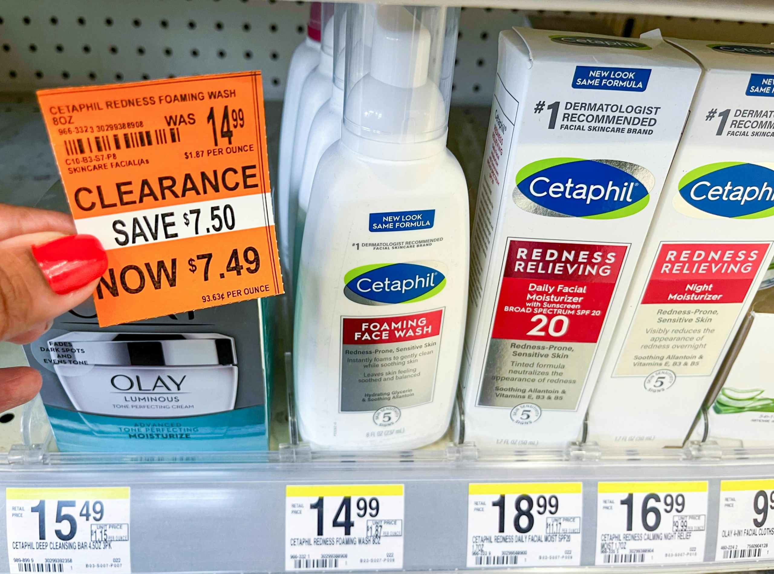 hand holding clearance tag next to bottle of Cetaphil redness foaming wash on shelf