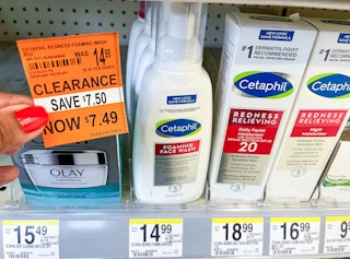 hand holding clearance tag next to bottle of Cetaphil redness foaming wash on shelf