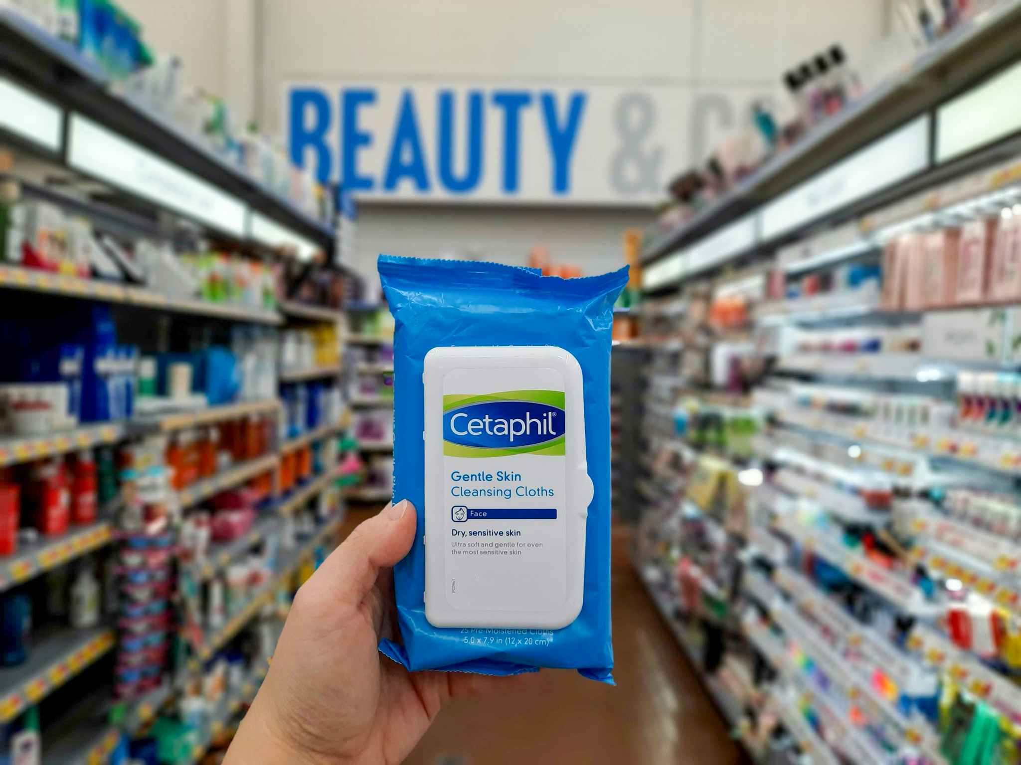 hand holding cetaphil wipes at walmart