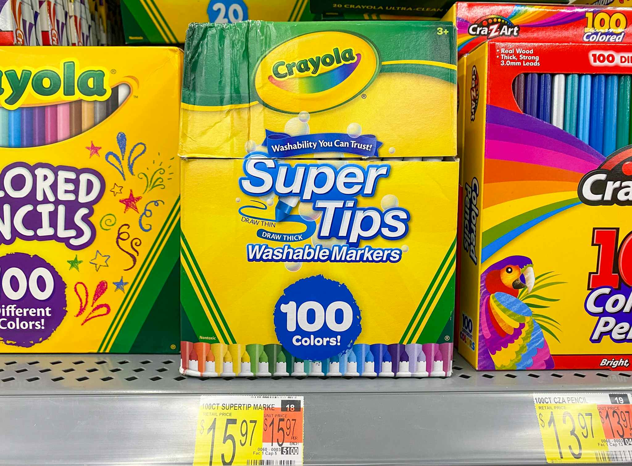 Set of 100 Crayola Super Tips Washable Markers on shelf at Walmart. Price tag reads $15.97.