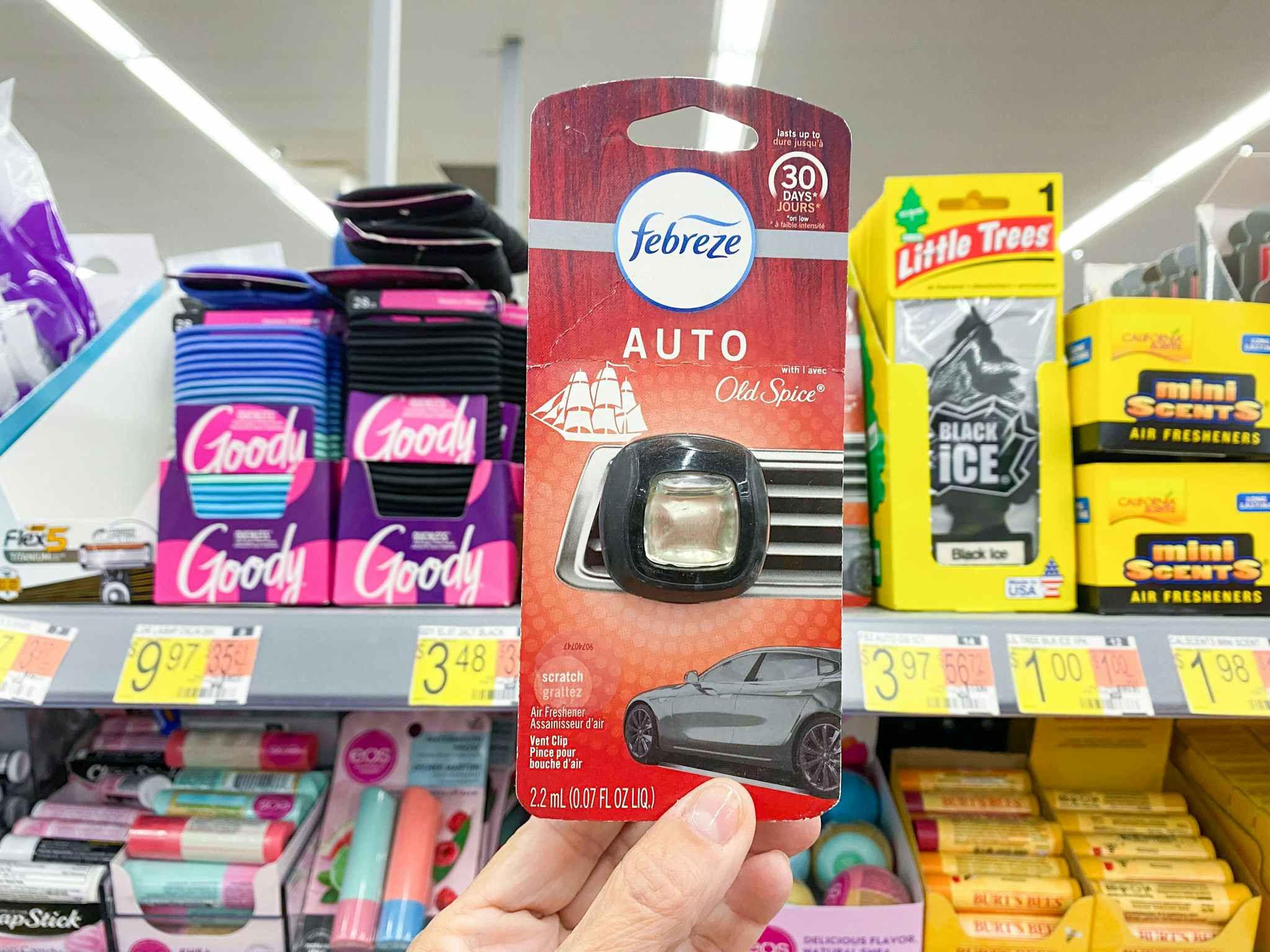 Febreze Auto Air Freshener held in car care supplies aisle at Walmart