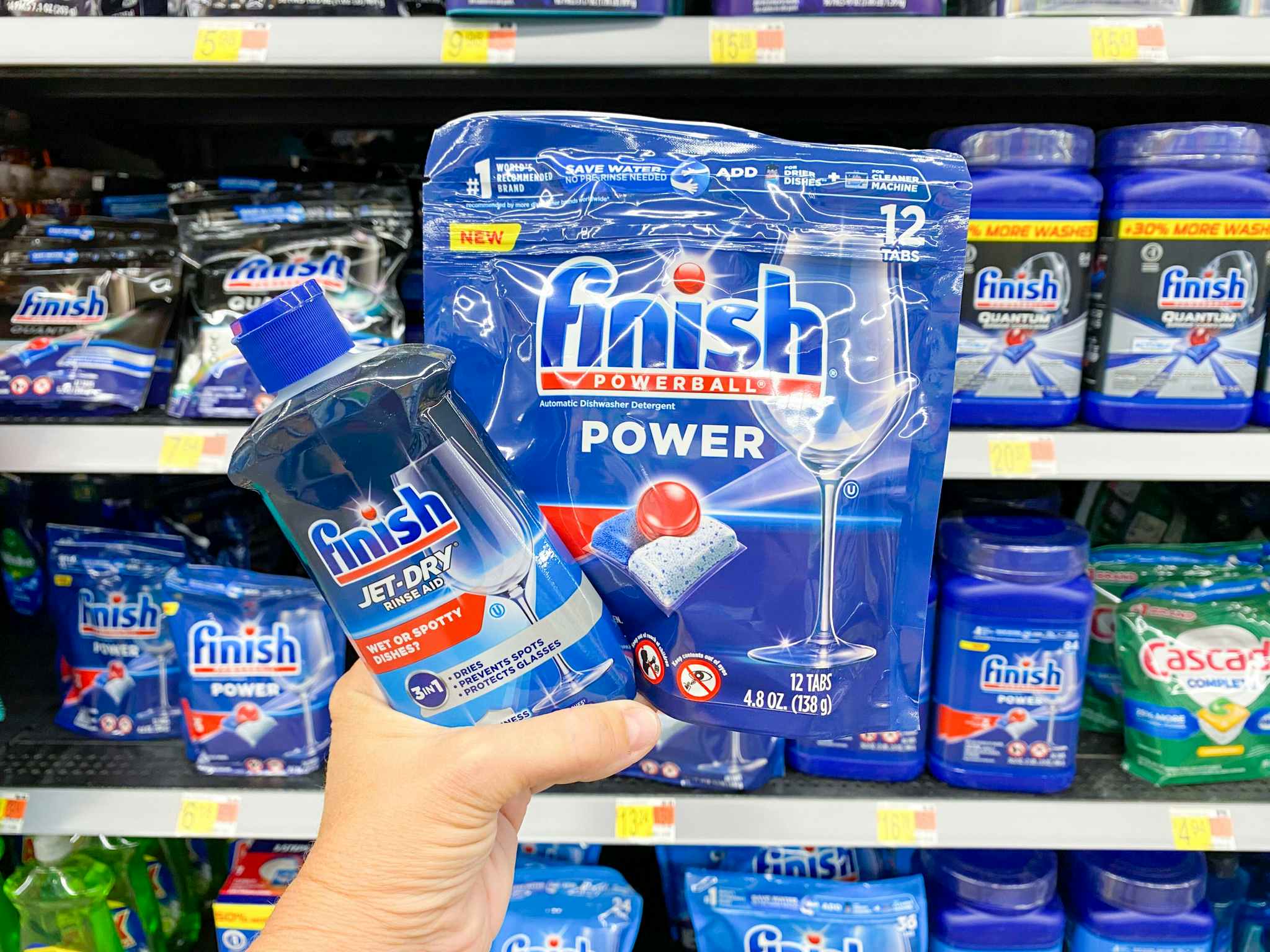 Finish Powerball Tabs and Finish Jet Dry Rinse Aid held in cleaning aisle at Walmart