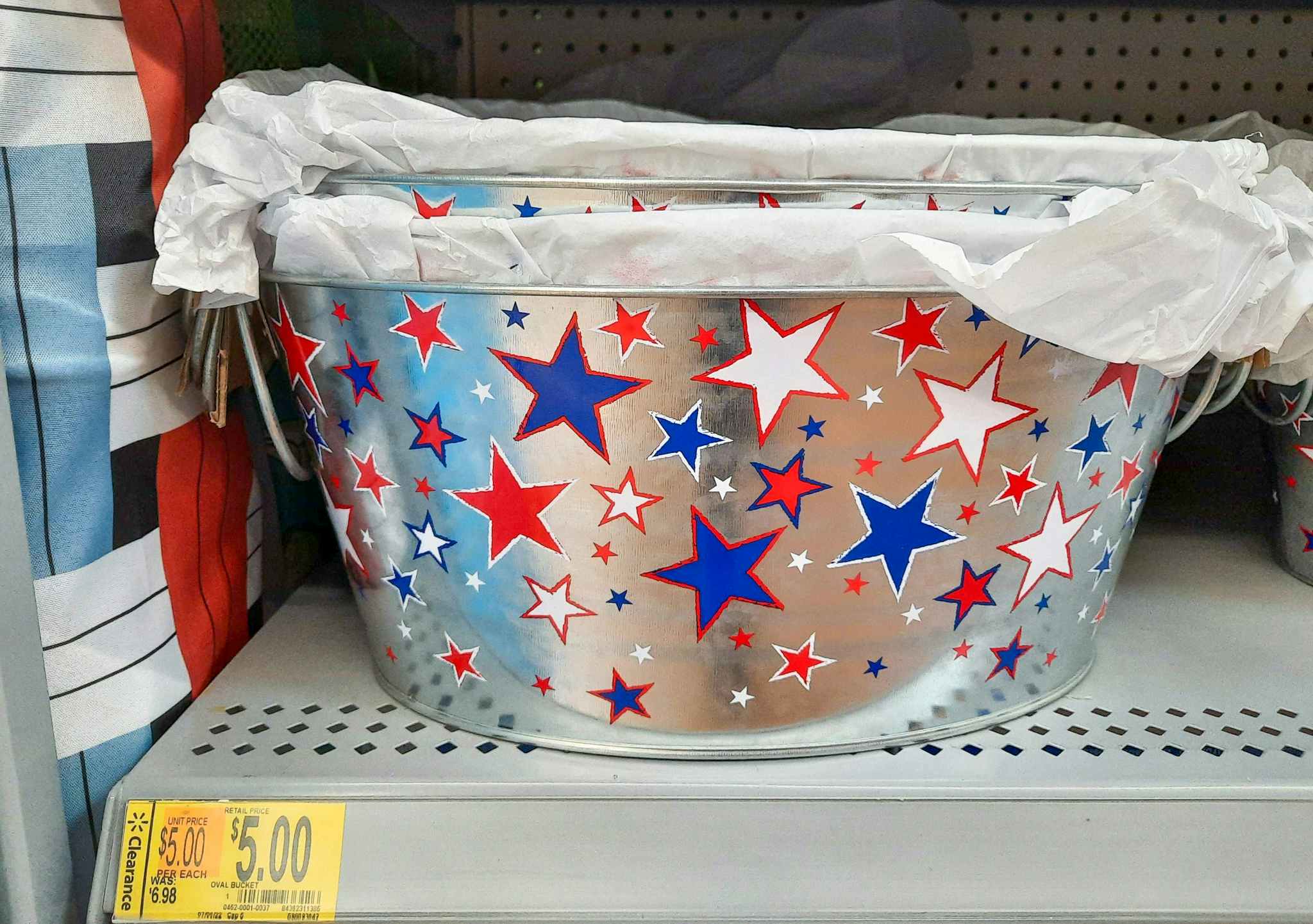 Fourth of July Steel Bucket on clearance at Walmart. Price tag indicates the price is $5, regularly $6.98.