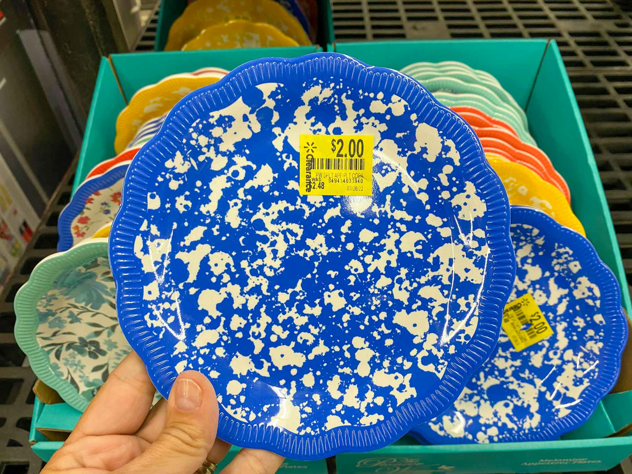 hand holding pioneer woman cobalt appetizer plates at walmart