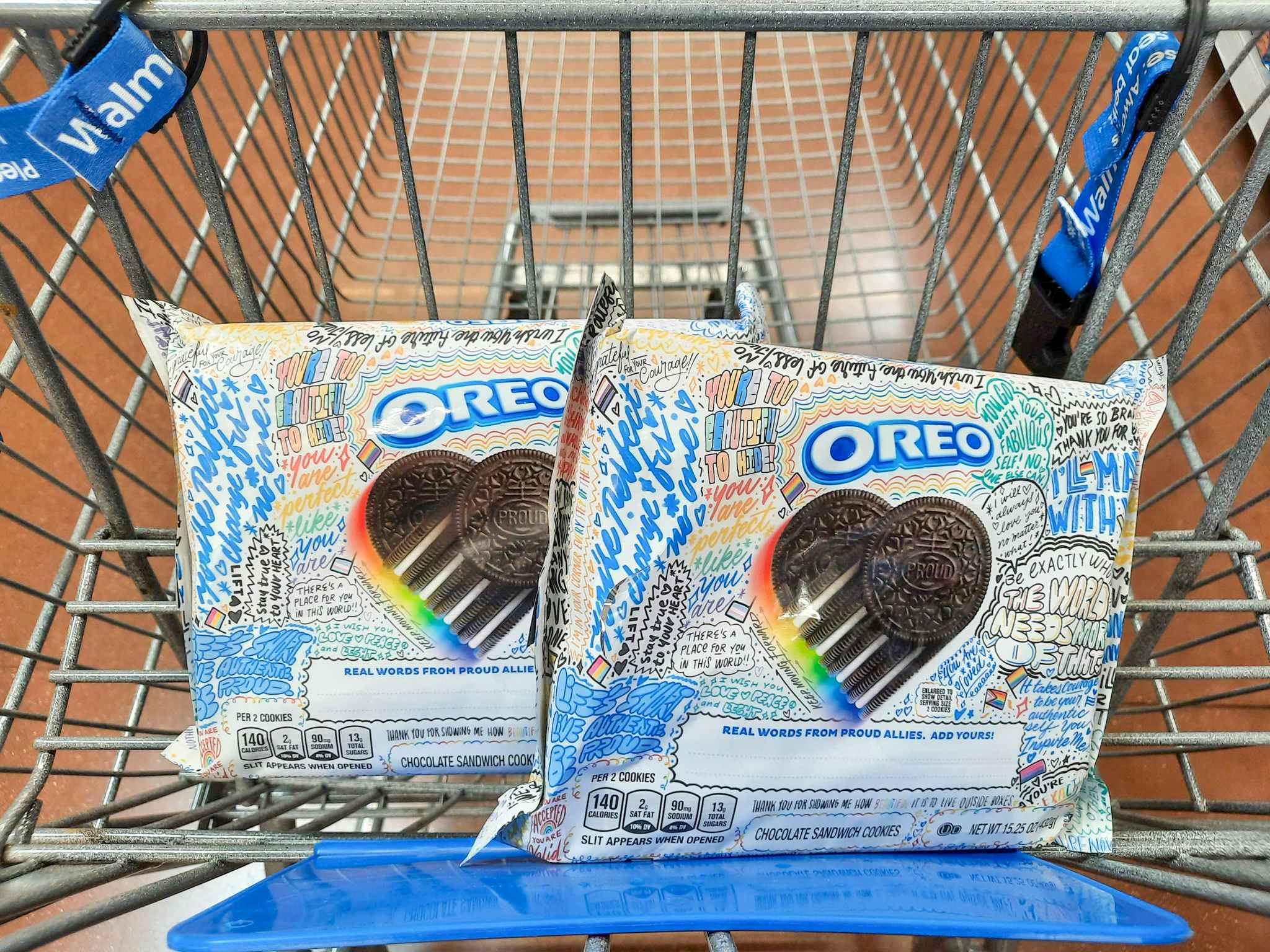 Two packages of Oreo Pride Cookies in Walmart shopping cart