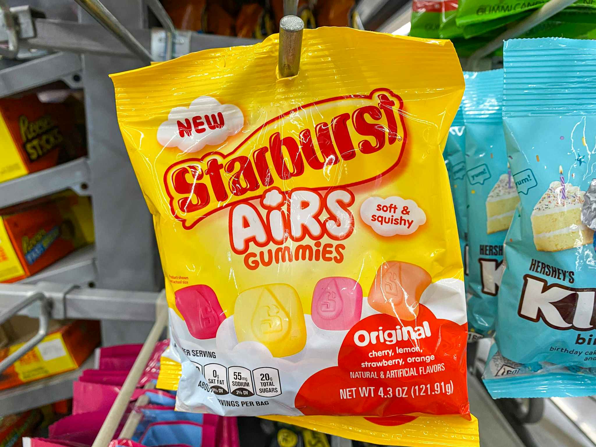 starburst airs gummies hanging on display at walmart