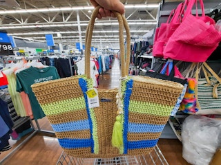 hand holding time and tru adrenaline lime raffia tote at walmart