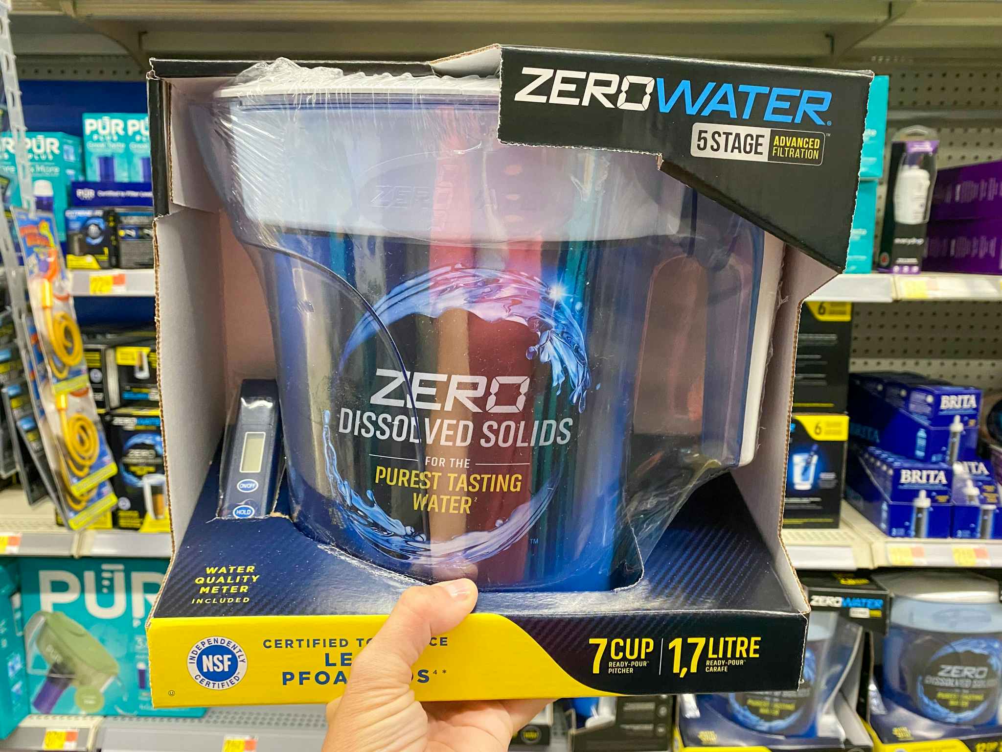 ZeroWater Pitcher held in front of shelf at Walmart