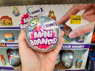 hand holding zuru 5 surprise mini brands at walmart