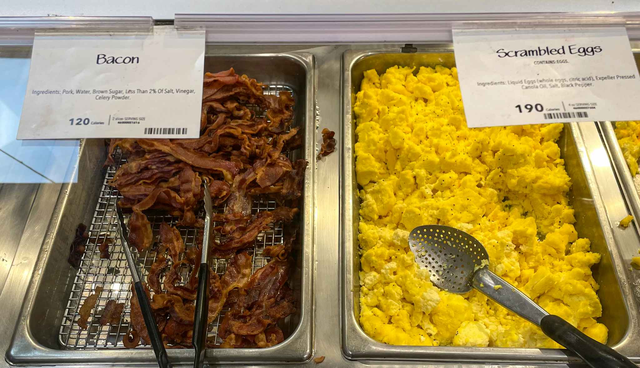 bacon and eggs in a hot bar at whole foods