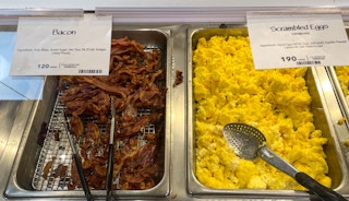 bacon and eggs in a hot bar at whole foods