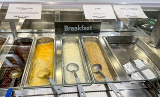 oatmeal grits and syrup in a hot bar at whole foods