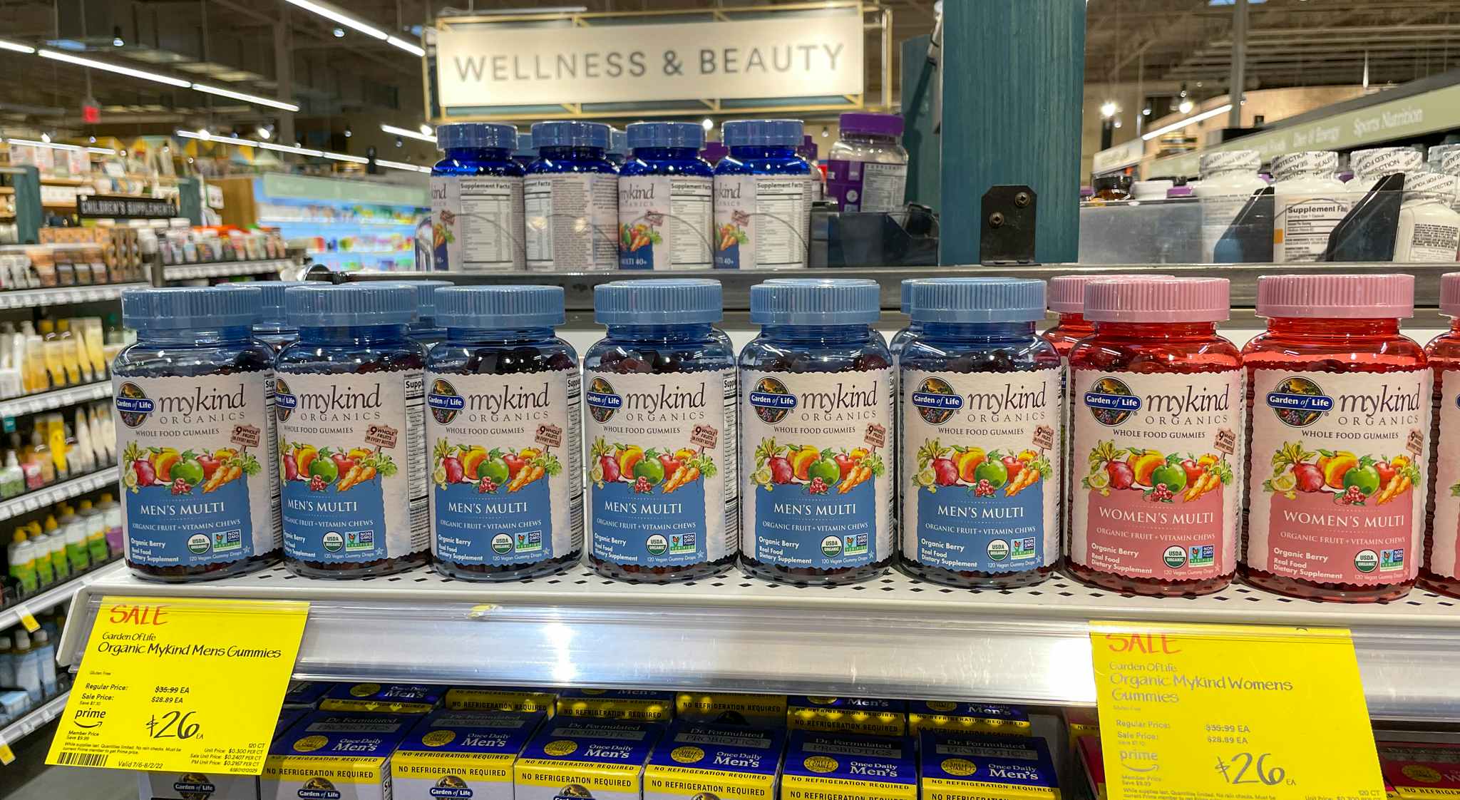 garden of life vitamins on a shelf with sales tag at whole foods