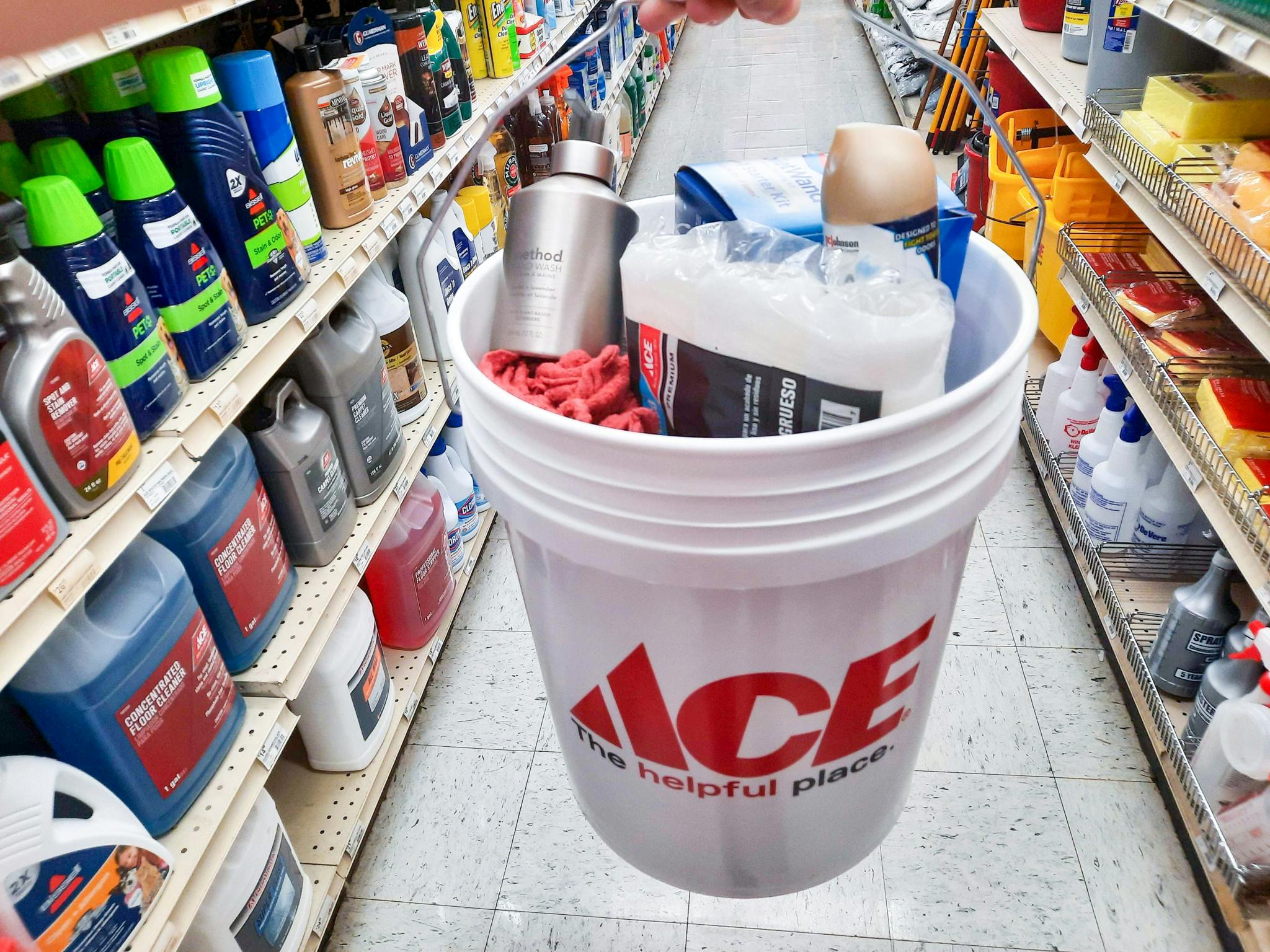5-gallon Ace Hardware bucket filled with Glade, Method, and Ace brand products.