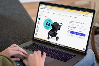 A person looking at the Albeebaby website on a laptop computer.