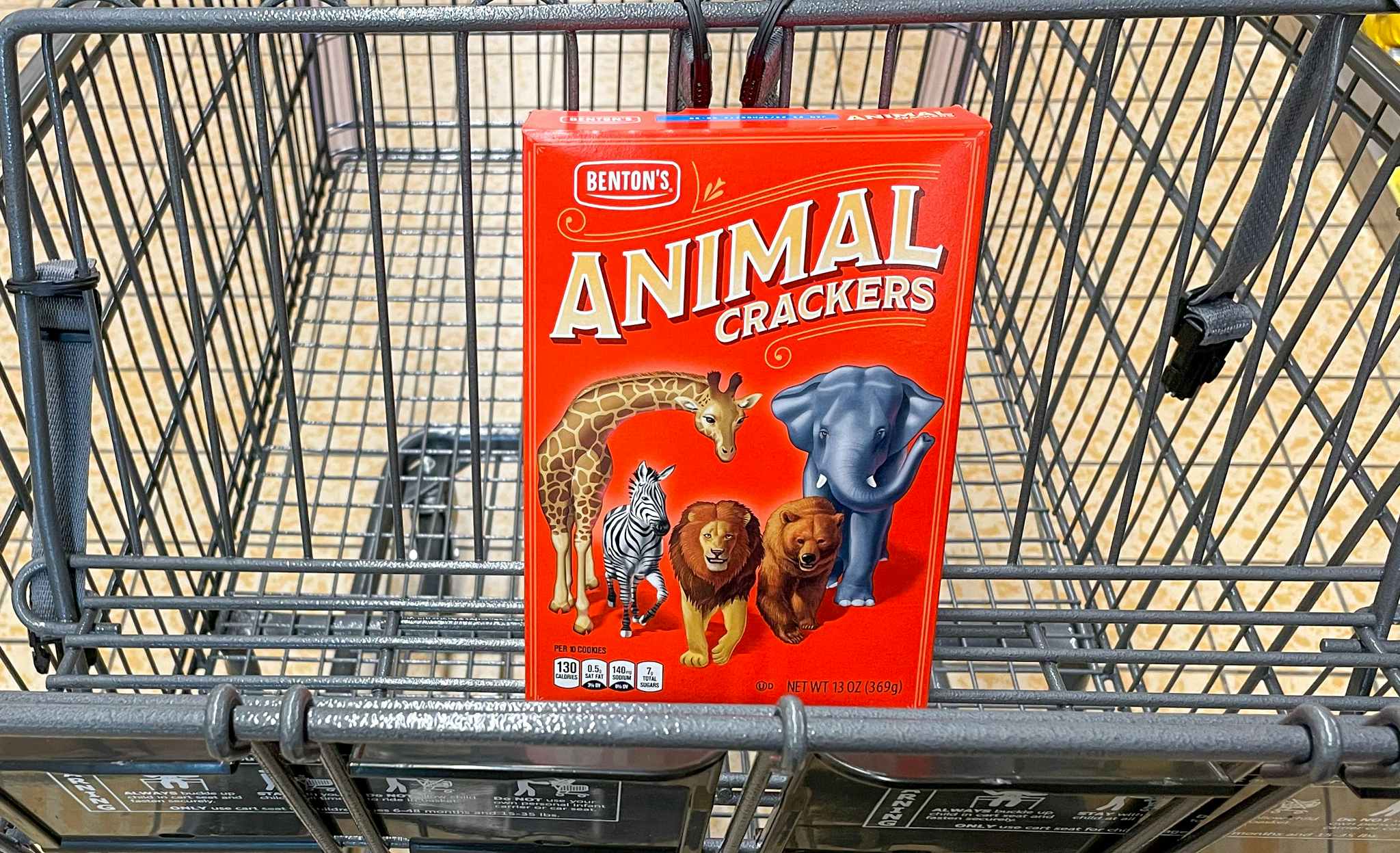 benton's animal crackers in a box in a cart at aldi