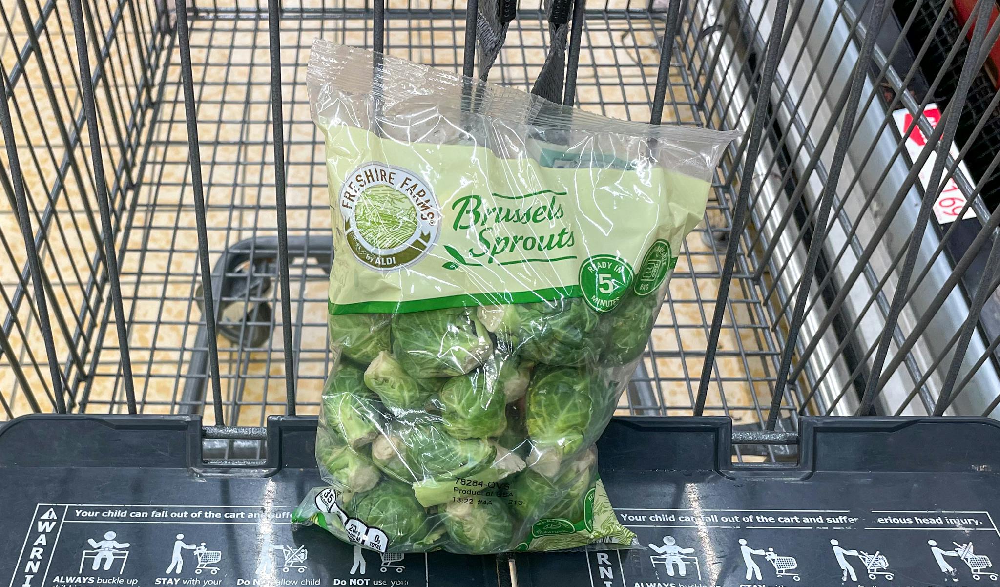 packaged brussel sprouts in a cart at aldi