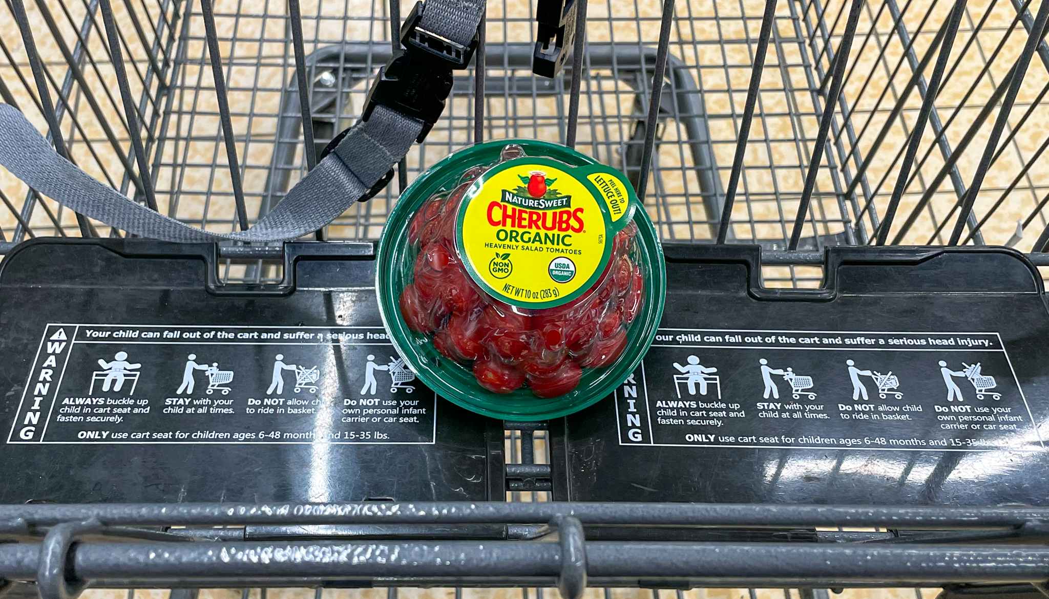grape tomatoes in a cart at aldi