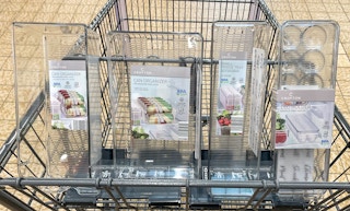 fridge trays in a cart at Aldi
