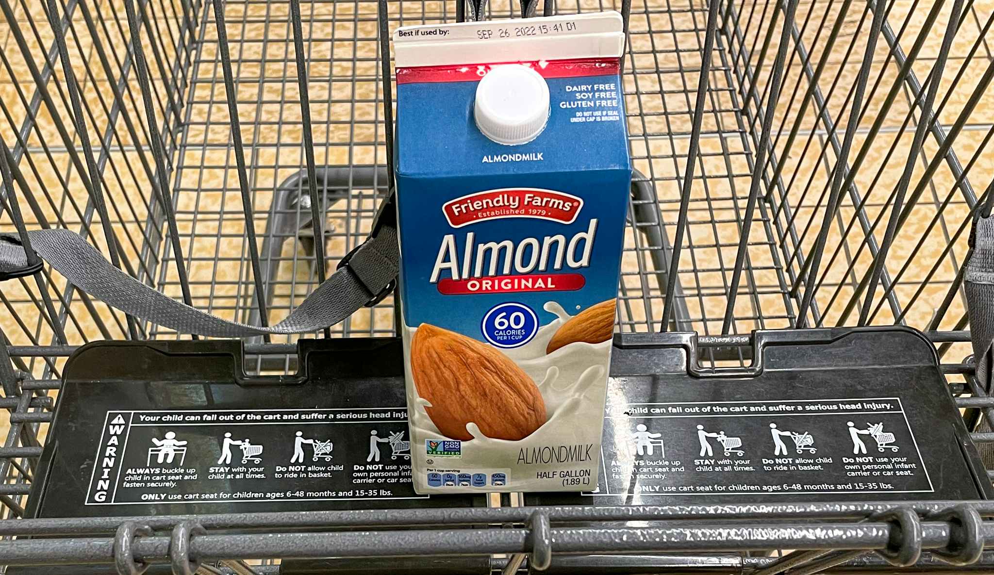 almond milk in a cart at aldi