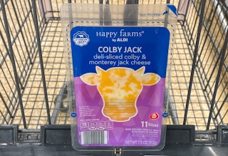 packaged cheese in a cart at aldi