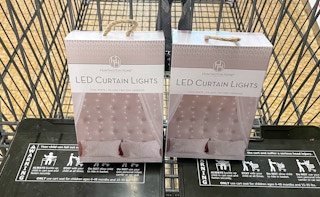 curtain lights in a box in a cart at aldi