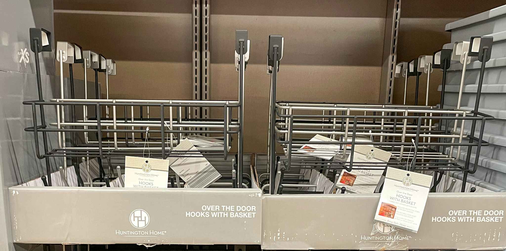 over the door hooks in a display on a shelf at aldi