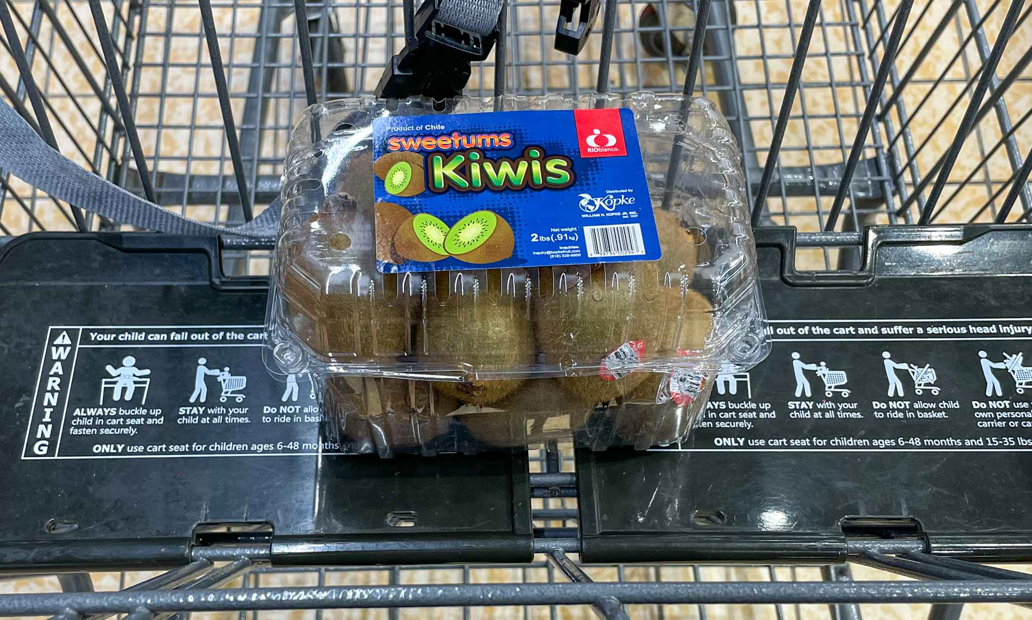 packaged kiwi in a cart at aldi