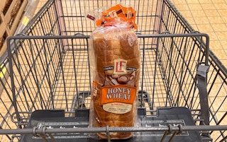 honey wheat bread in a cart at aldi 