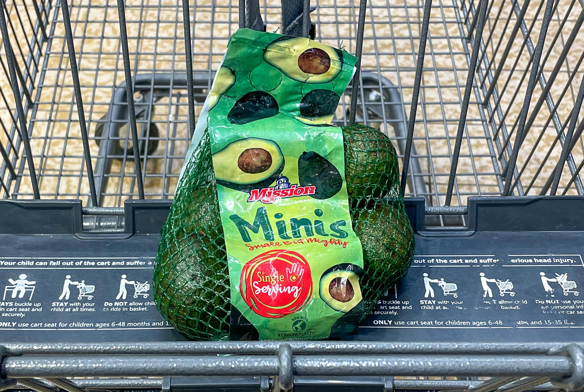 packaged mim avocados in a cart at aldi 